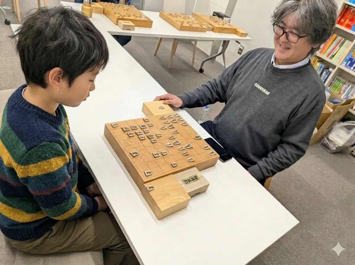 庄司俊之講師が子どもに将棋を指導している様子
